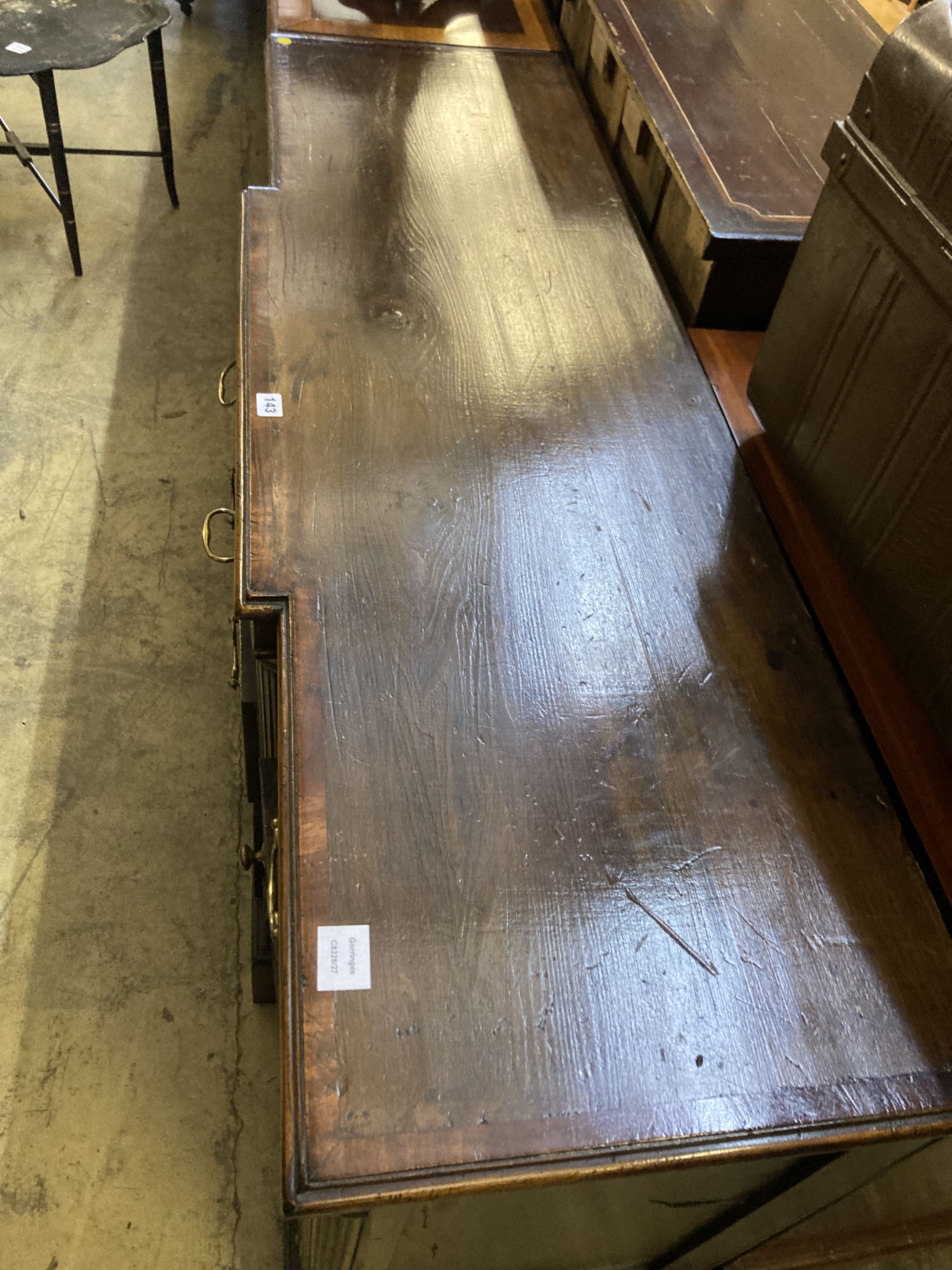 A George III style cross banded oak break front low dresser, width 50cm, depth 47cm, height 83cm